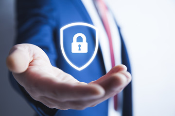 Businessman hand digital padlock