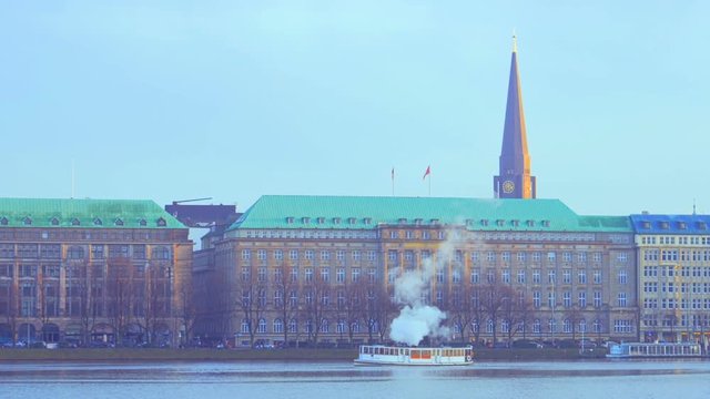 Alster lake and Hamburg city panorama with cruise ship, Germany