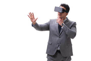 Businessman wearing virtual reality VR glasses isolated on white