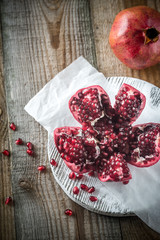 Pomegranate on the wooden board