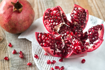 Pomegranate on the wooden board