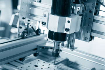 Milling machine working on steel detail.