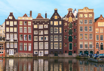 Amsterdam - old houses along the canal - 183245424