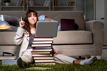 Two students studying late preparing for exams