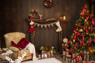 New Year and Christmas 2018. Christmas socks and nadmis Magic over the decorated fireplace