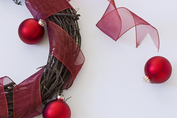 Wooden Vine Wreath with Red Ribbon & Ornaments - Powered by Adobe