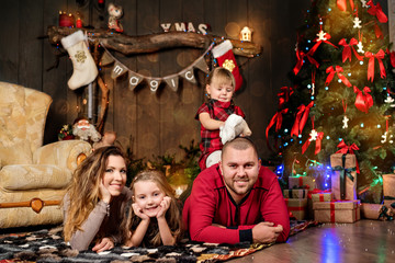 New Year and Christmas 2018. Family fun opening Christmas presents