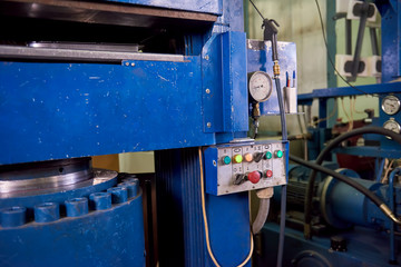 Hydraulic press machine, control panel. Equipment at the factory. Hydraulic system example.