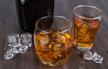 two whisky on the rock on wood and wood background