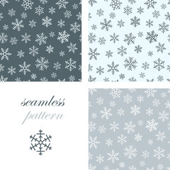 Seamless simple pattern of different blue geometric snowflakes