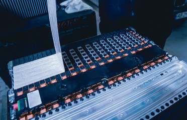 Charging the batteries of the elecric motor. Disassembling the battery of an electric vehicle engine