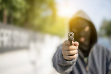 Young man took aim with pistol near village roads.