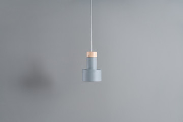 Hanging metal gray lamp with wooden part