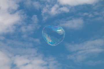 Blown bubbles floating in the sky