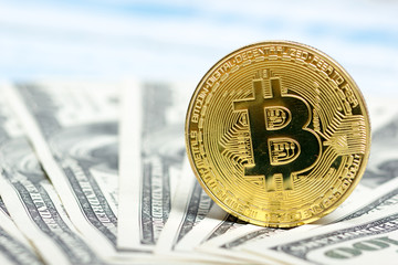 Bitcoin golden coin New virtual money and dollar background . Cryptocurrency. Business and Trading concept. Close-up shot