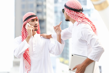 Arab two business man couple quarrels in the city