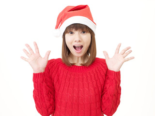 女性　クリスマス　驚き