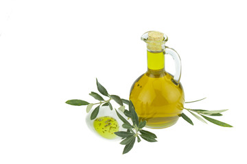 Olive oil Bottle and bowl plate with olive branch. Virgin olive oil. Natural olive oil, healthy food. Natural mediterranean food. Bread dipping.