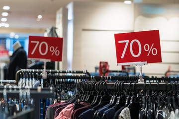 sale 70% off mock up advertise display frame setting over the clothes line in the shopping...
