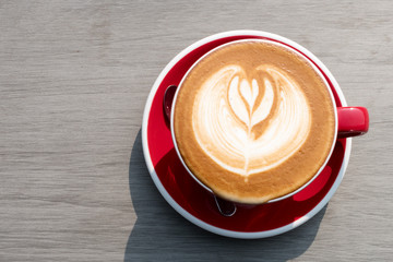 cappuccino coffee with abstract shape foam