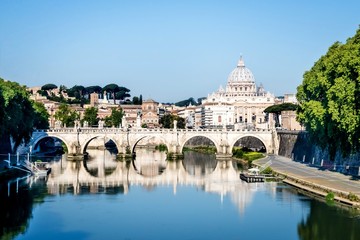 View to the St. Peter's basilica from the Tiber river in Rome, Italy.