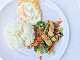 Stir Fried Crispy pork with Roasted Chili Paste and mixed vegetables;  basil; kale; broccoli;...