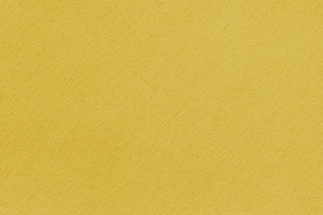 Yellow washed paper texture background. Recycled paper texture.