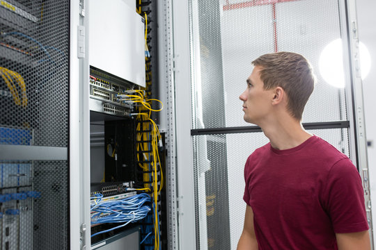 portrait of young man in data center