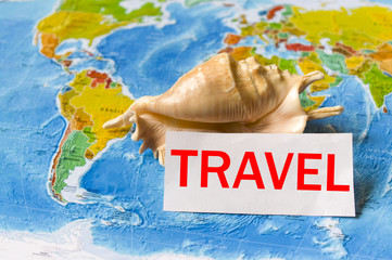Image of the concept of travel, map with a shell.