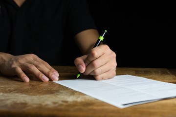Businessman Signing a paper