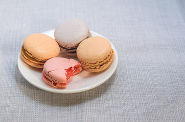 Bitten macaroon cake plate, close up