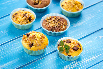 Fresh muffins with nuts and chocolate