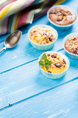 Fresh muffins with nuts and chocolate