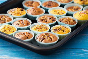 Fresh muffins with nuts and chocolate