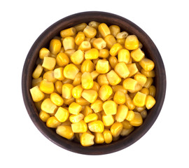 Sweet corn kernels in bowl over white