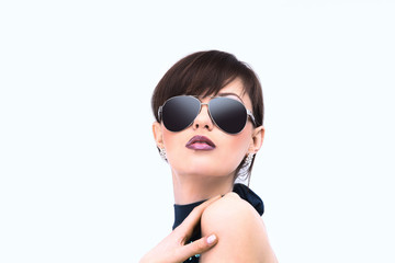 portrait of young woman in dark glasses.