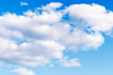 Fototapeta na wymiar awesome fluffy clouds on blue sky.