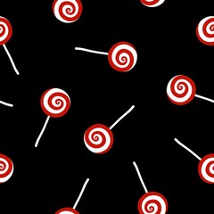 Seamless pattern with Christmas candy on black background.