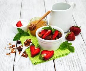 Homemade granola with strawberries