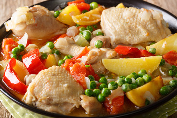 Philippine Food: Afritada Chicken with vegetables close-up. horizontal