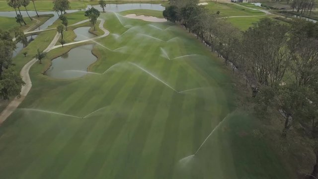 Aerial view of golf course sprinkler on fairway