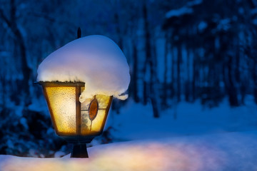 street lantern under the snow in the winter night - Powered by Adobe