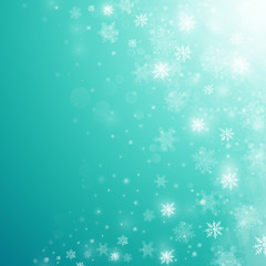 Christmas winter abstract background with snowflakes, bokeh lights and place for text. Xmas New Year's wallpaper
