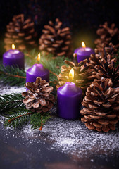 Pine cones and candle