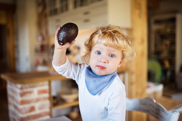 Toddler boy in the kitchen.