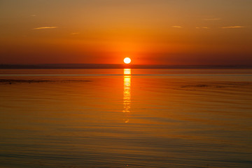 Sunrise early in the morning over the sea