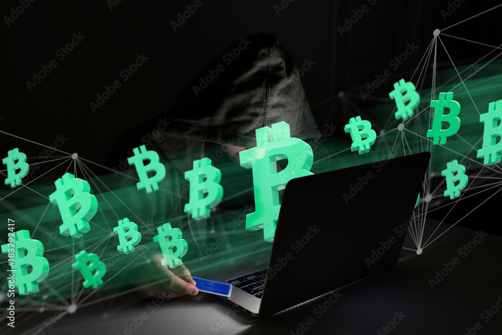 Poster hacker man in the dark using computer to hack data and information system