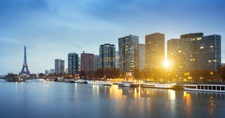 Fototapeta premium Eiffel tower, Beaugrenelle district and Seine river in Paris, France
