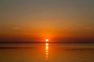 Sunrise early in the morning over the sea