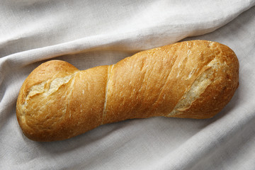 .Italian bread of ciabatta on homespun linen canvas.